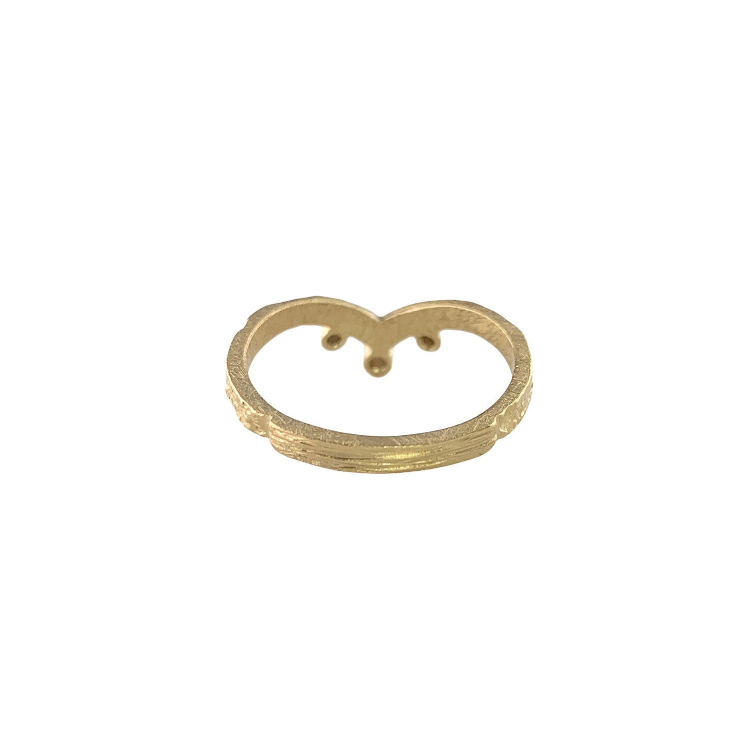 Back view of pounded texture gold ring that dips down to a V shape. Three gold backings accent the bottom and sides of the V.