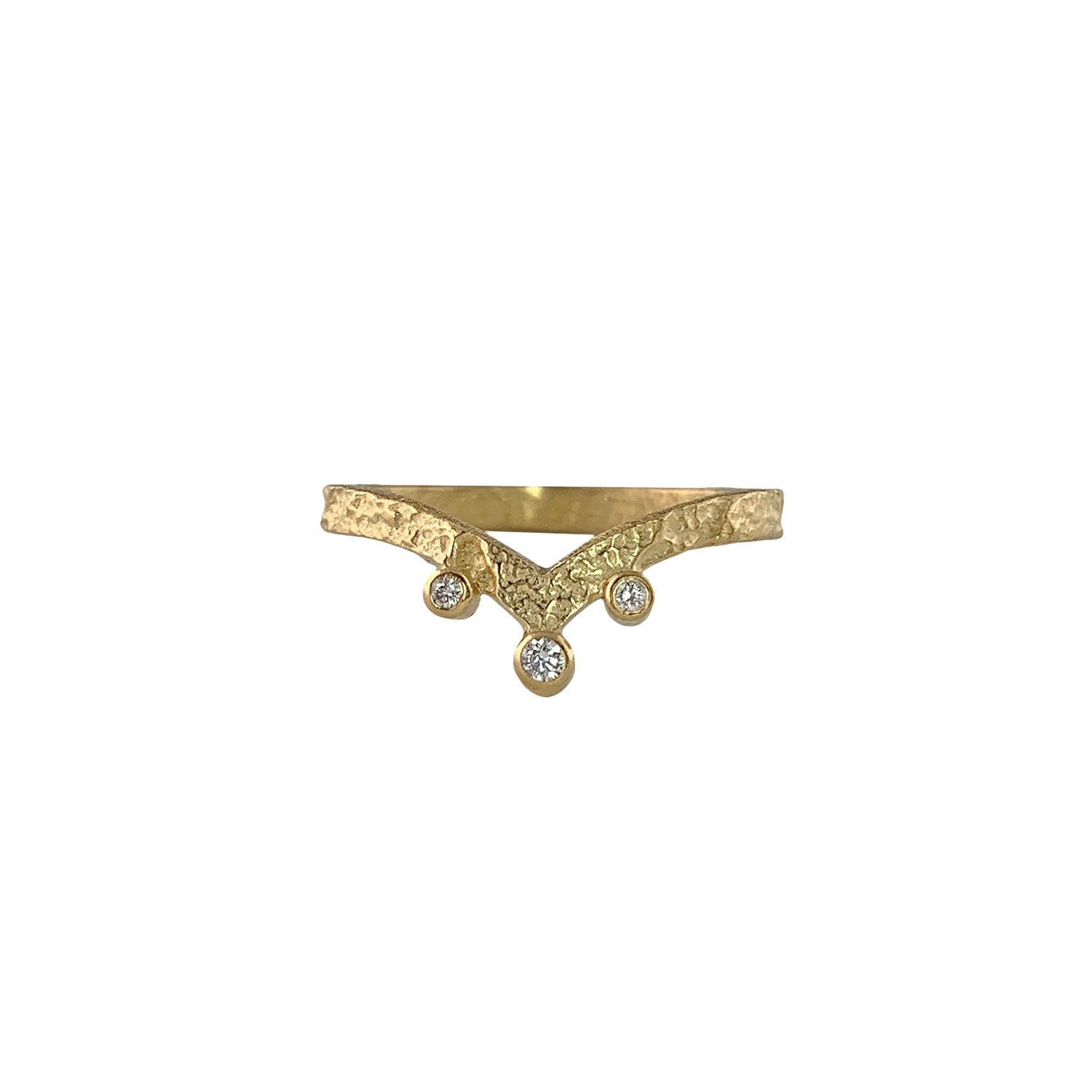 Front view of pounded texture gold ring that dips down to a V shape. Three gold-wrapped white diamonds accent the bottom and sides of the V.