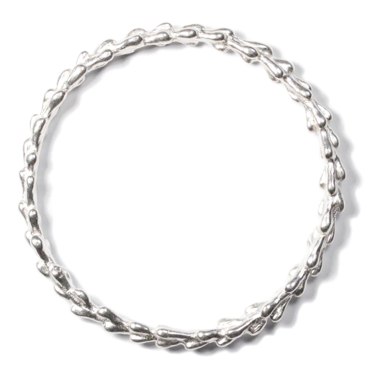 Silver bangle bracelet with an intertwined, vine-like pattern and a rustic finish.